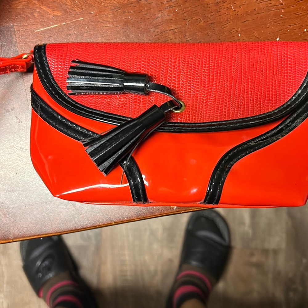 Stylish Red Wristlet with Black Trim